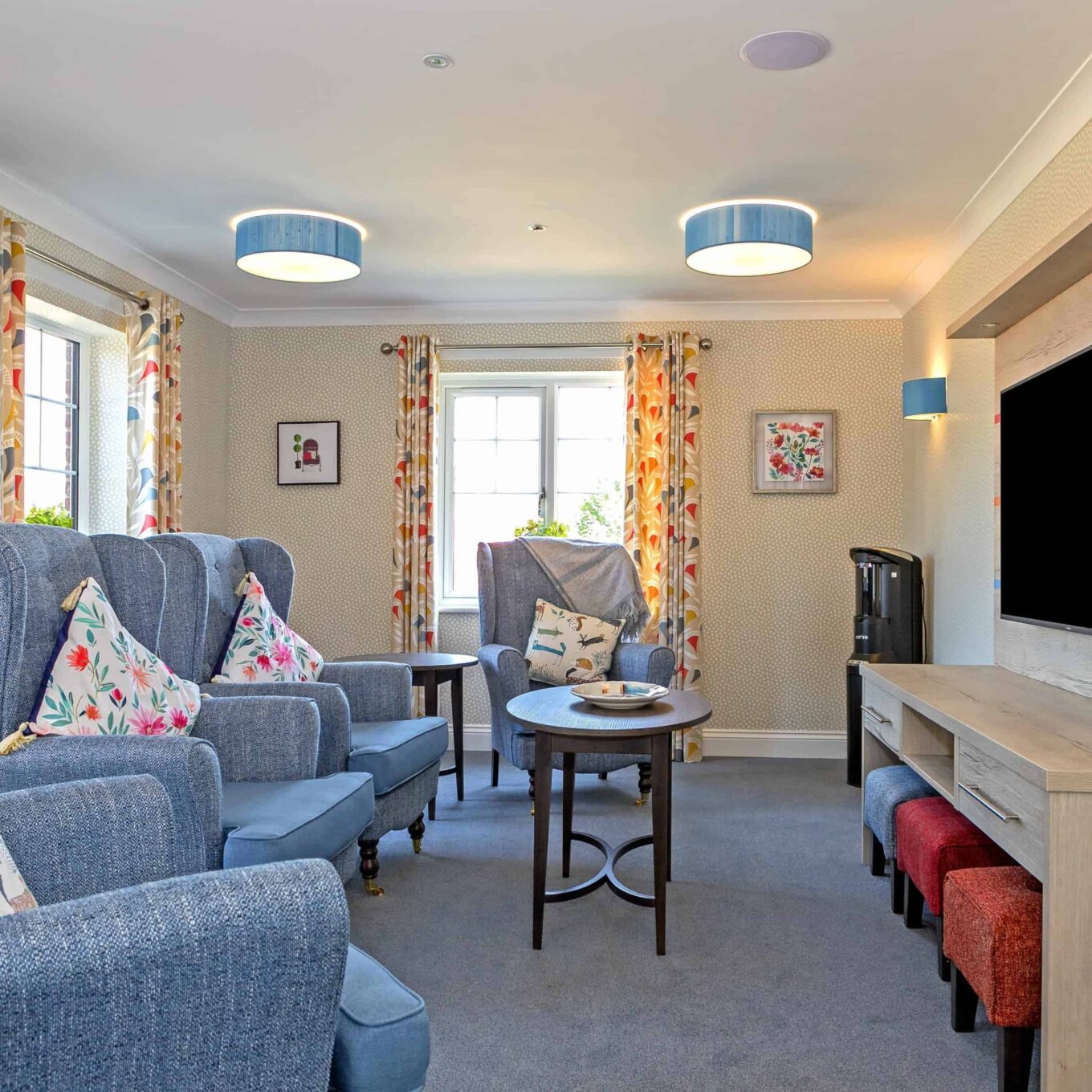 TV room with chairs and coffee table at Beechwood Grove Care Home