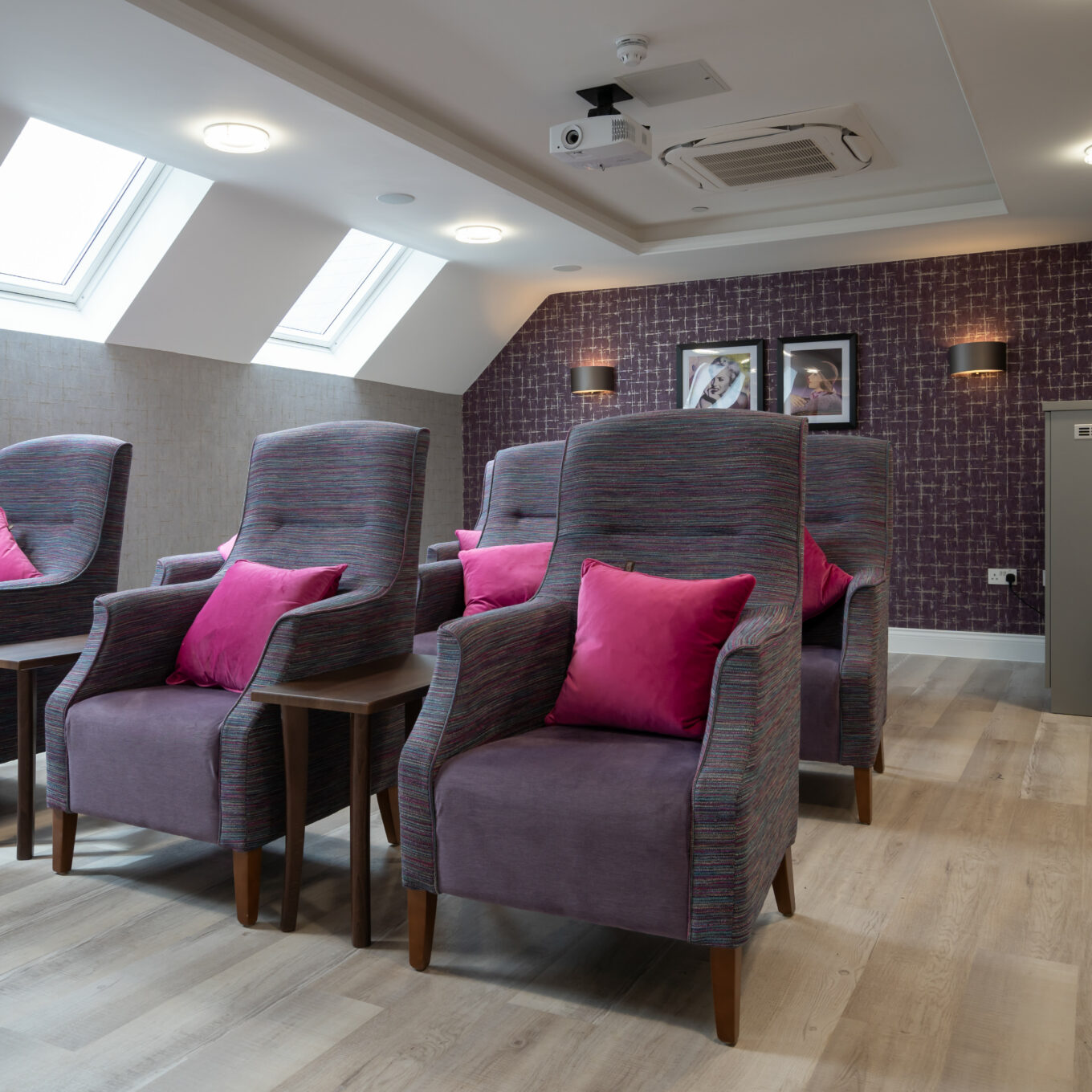 Cinema room chairs and projector at Elmbrook Court Care Home