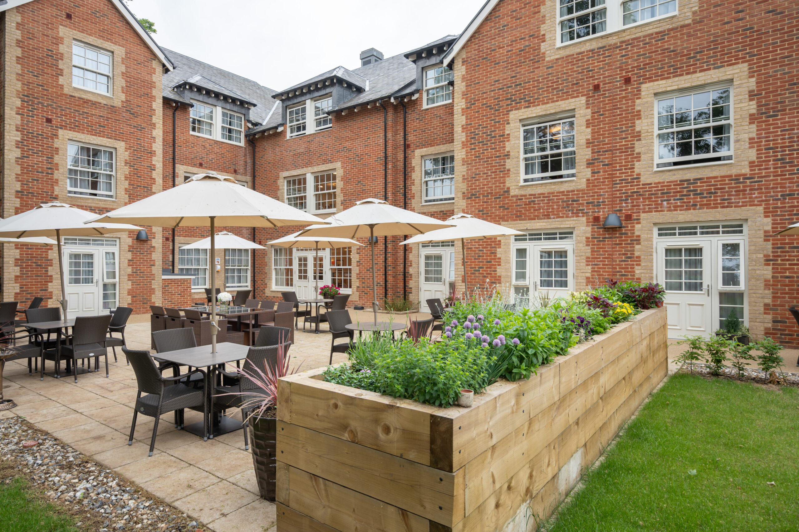 Outdoor seated patio area at Elsyng House Care Home in Enfield
